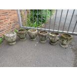 A SET OF SIX STONE ROMAN STYLE PLANTERS H-26 CM (6)