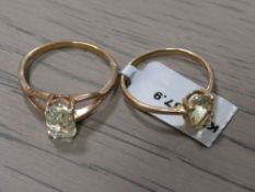 A LADIES 10K GOLD SINGLE CITRINE SET RING TOGETHER WITH A SIMILAR 9CT EXAMPLE (2)
