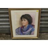 A GILT FRAMED AND GLAZED WATERCOLOUR PORTRAIT COLOUR OF A LADY CALLED TRACY SIGNED LOWER RIGHT BY