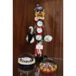 A MURANO GLASS FIGURE OF A CLOWN, H 33 cm, together with a Perthshire paperweight with central 'P'