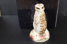A ROYAL CROWN DERBY PAPERWEIGHT IN THE FORM OF A MEERKAT - WITH BOX