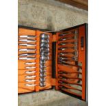 A WEBBER AND HILL RETRO STYLE CONTINENTAL STAINLESS STEEL CASED CANTEEN OF CUTLERY