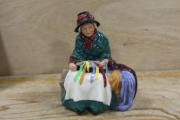 A ROYAL DOULTON FIGURINE 'SILKS AND RIBBONS'