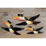 A SET OF THREE GUINNESS TOUCANS