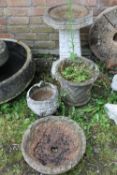 A BRICK EFFECT BIRD BATH, TWO STONE PLANTERS AND A BOWL (4)