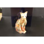 A ROYAL CROWN DERBY PAPERWEIGHT IN THE FORM OF A SIAMESE CAT - WITH BOX