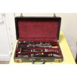 A CASE CONTAINING A VINTAGE SELMER CLARINET STYLE INSTRUMENT PIECES - NOT CHECKED