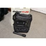 A PROSOUND PORTABLE MINI PA SYSTEM WITH MICROPHONE - NOT CHECKED