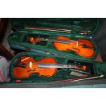 TWO CASED TINY VIOLINS;