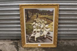 A GILT FRAMED OIL ON BOARD TYPE PICTURE OF A FARMER DRIVING GEESE TO THE STREAM, SIGNED LOWER LEFT
