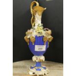 AN ORNATE ANTIQUE GILT EWER DECORATED WITH FLOWERS AND BUNCHES OF GRAPES - A/F BADLY DAMAGED AND