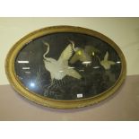 A ANTIQUE OVAL FRAMED SILKWORK DEPICTING BIRDS IN FLIGHT W 92 CM