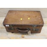 A VINTAGE FITTED SUITCASE COMPLETE WITH VANITY JAR, BRUSHES, ETC