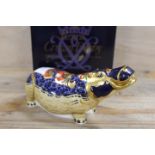 A ROYAL CROWN DERBY PAPERWEIGHT IN THE FORM OF A HIPPOPOTAMUS - WITH BOX