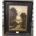 A FRAMED OIL ON BOARD OF A COUNTRY SCENE SIGNED BOTTOM CENTRE T UBSDELL