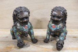 A PAIR OF BRASS CLOISONNE ENAMEL EMBELLISHED SEATED DOGS OF FO