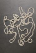 AN ANTIQUE SILVER MUFF CHAIN - APPROX 55" IN LENGTH