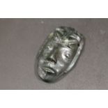 A JADE PENDANT IN THE FORM OF A FACE MASK - WITH SOME REPAIR