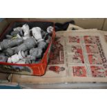 A TIN OF CERAMIC CHESS PIECES TOGETHER WITH A SMALL QUANTITY OF VINTAGE COMICS