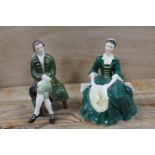 TWO ROYAL DOULTON FIGURINES - A GENTLEMAN FROM WILLIAMSBURG AND A LADY FORM WILLIAMSBERG