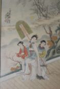 A BAMBOO STYLE GILT FRAMED AND GLAZED JAPANESE BLOCK PRINT OF A LADY AND HER TWO ASSISTANTS