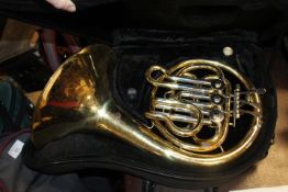 A CASED FRENCH HORN