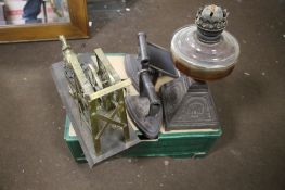 A TRAY CONTAINING A BRASS COAL MINING ORNAMENT ON WOODED PLINTH, TWO FLAT IRONS AND A LARGE POCKET