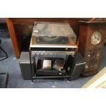 A FERGUSON RECORD PLAYER WITH STAND AND MATCHING SPEAKERS TOGETHER WITH A BOX OF CASSETTES