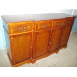 A YEW WOOD SIDEBOARD