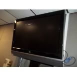 A 41" LG SONY TV WITH ADJUSTABLE WALL MOUNT (BY ROSTRUM)