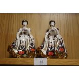 A PAIR OF ENGLISH MADE FINE BONE CHINA IMARI PATTERN LADY FIGURINES