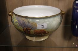 A HAND PAINTED BOWL WITH CATTLE SIGNED F CLARKE