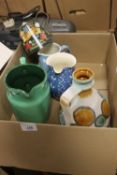 A BOX OF FIVE JUGS, ONE IS BARGE WARE