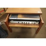 A SONY MUSIC CENTRE MOUNTED IN A TEAK TABLE