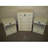 A LOUIS STYLE FIVE DRAWER CHEST OF DRAWERS AND TWO MATCHING BEDSIDE CABINETS