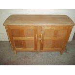 A WOODEN SIDEBOARD STYLE OF ERCOL
