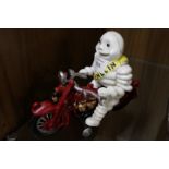 ***A CAST MICHELIN FIGURE ON A MOTORCYCLE**