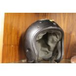 A VINTAGE MOTORCYCLE HELMET