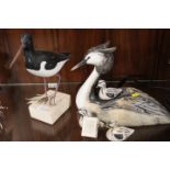 TWO MODERN WOODEN DISPLAY MODELS OF BIRDS TO INCLUDE A GREBE WITH THREE CHICKS