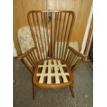 AN ERCOL COTTAGE SUITE ARMCHAIR