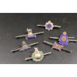 SIX MILITARY SILVER AND ENAMEL BAR BROOCHES