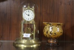 A EARLY 20TH CENTURY TORSION CLOCK UNDER GLASS DOME