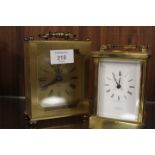 A BENSON QUARTZ BRASS CASED CARRIAGE CLOCK TOGETHER WITH ANOTHER (2)