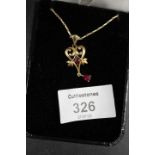 A HALLMARKED 9CT GOLD GEMSET PENDANT AND CHAIN - APPROX WEIGHT 5.5 G