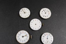 FIVE ANTIQUE WRIST WATCH MOVEMENTS