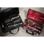 A CASED YAMAHA CLARINET TOGETHER WITH ANOTHER