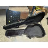 A CHASE GUITAR CASE AND A STAGG MUSIC STAND