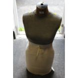 A VINTAGE DRESSMAKER'S DUMMY