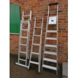 AN ABRU PLATFORM PLUS COMBINATION LADDER WITH A BLACK AND DECKER 3-WAY LADDER AND A MASTERSTEP