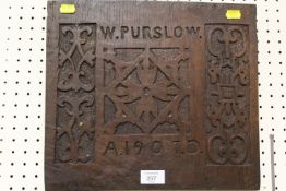 A CARVED WOODEN PANEL 'W PURSLOW' 1907